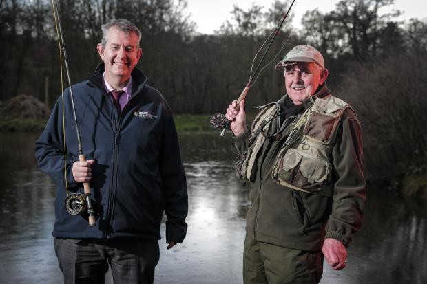 Minister Poots pictured with angler Joe Stitt at Shaws Bridge Belfast